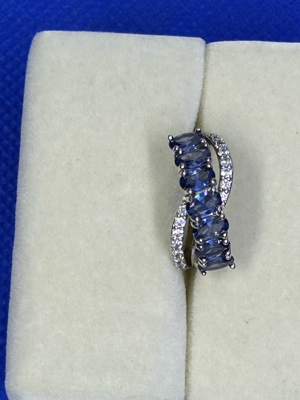 Elegant Tanzanite Ring with Clear CZ Accent stones set in 925 Sterling Silver